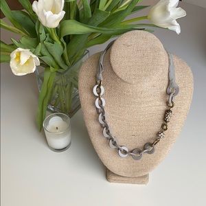 Gray chain necklace with brass and crystal accents
